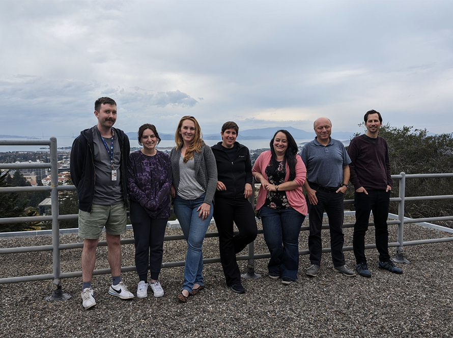 Members of the Heavy Element Group posing outside.