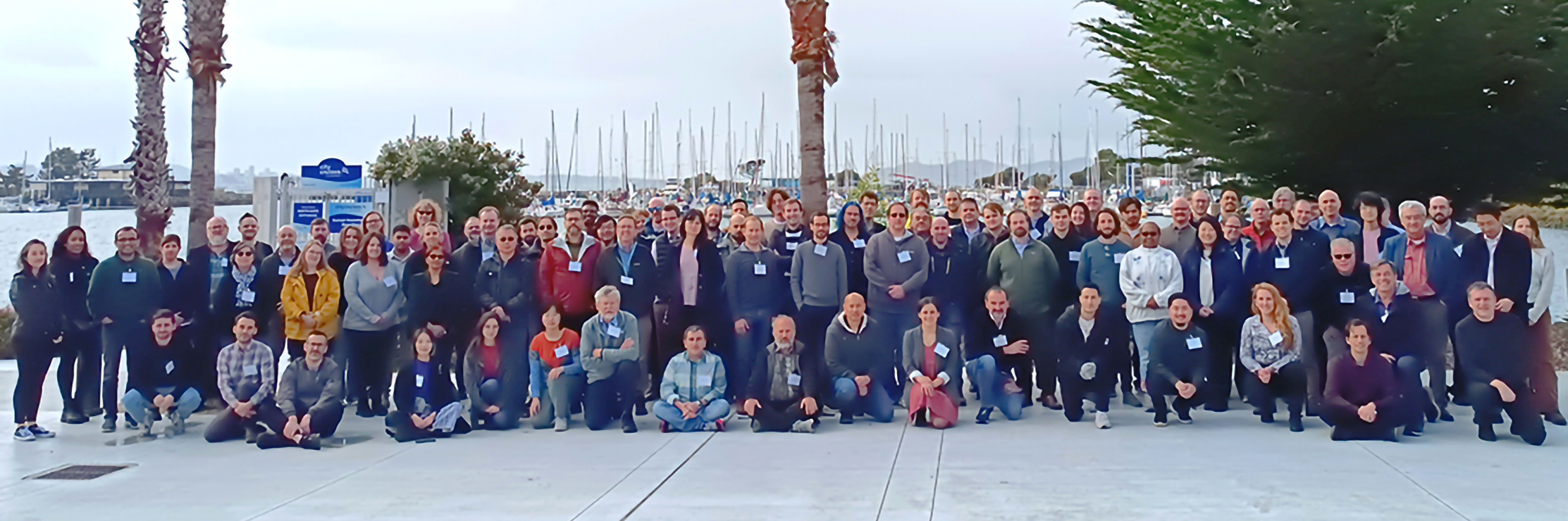 Large group of NSD Retreat participants posed outdoors